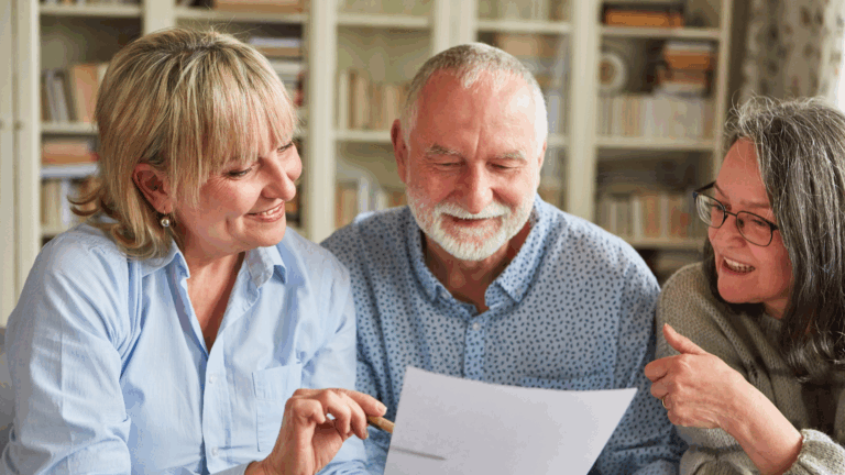 Couple reviewing financial documents with concerned expressions, highlighting the impact of inflation on retirement planning—BCA Private Wealth helps families in Greenville and Clemson, SC create personalized strategies to reduce financial stress and stay on track.
